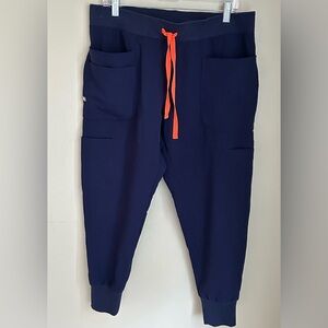 Figs Navy scrub joggers. Size Large/petite. Orange contrast tie. Great shape!
